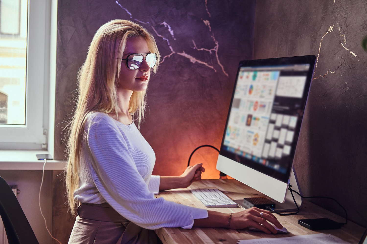 Developer working at a desk on a website build